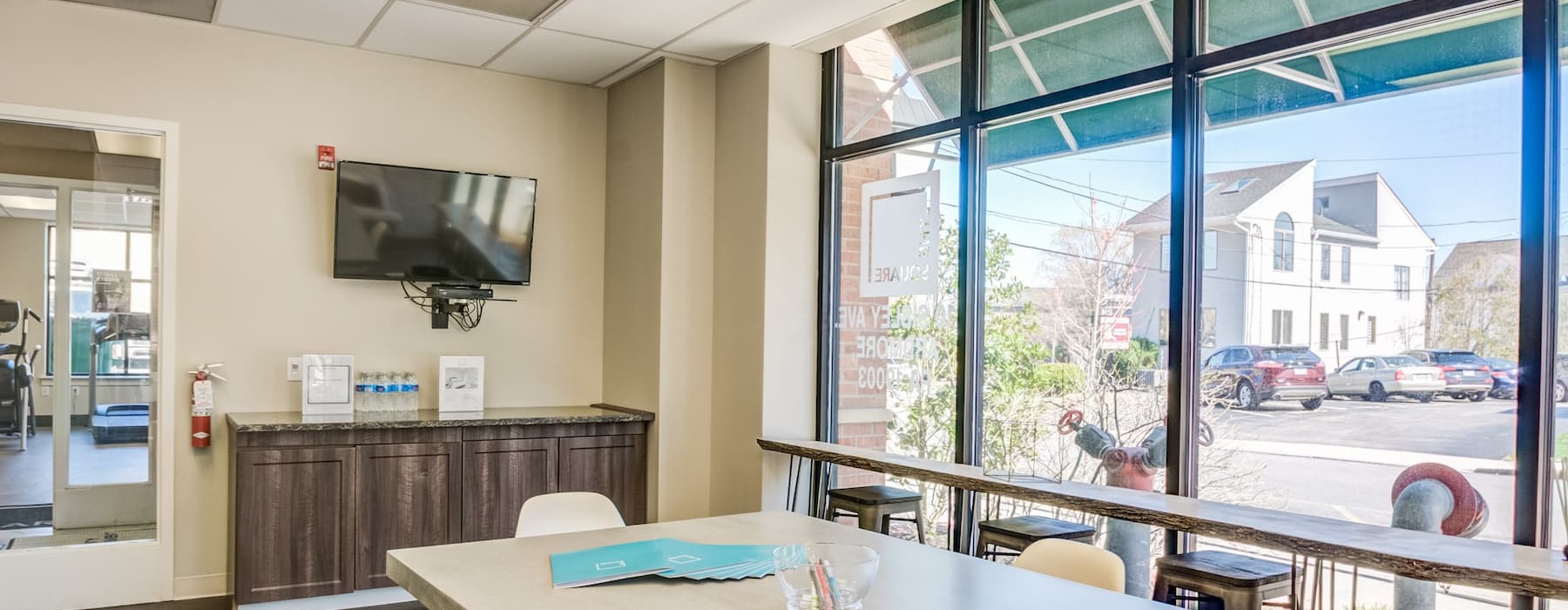 community room with seating and bright lighting